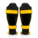 Schienbeinschoner Fairtex Wettbewerb SP5 mit gelben Fußschutz 